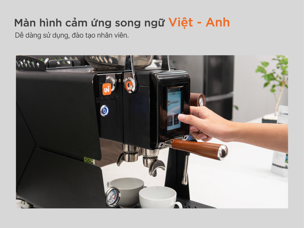 máy pha cà phê tự động tại bình dương Máy pha cà phê tự động Unibar với màn hình cảm ứng song ngữ tiện lợi.